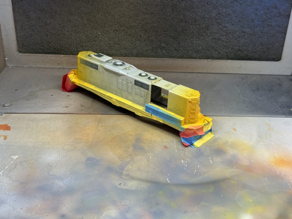 Repaiting a GP9: front and rear painted Vallejo Yellow Ochre.
