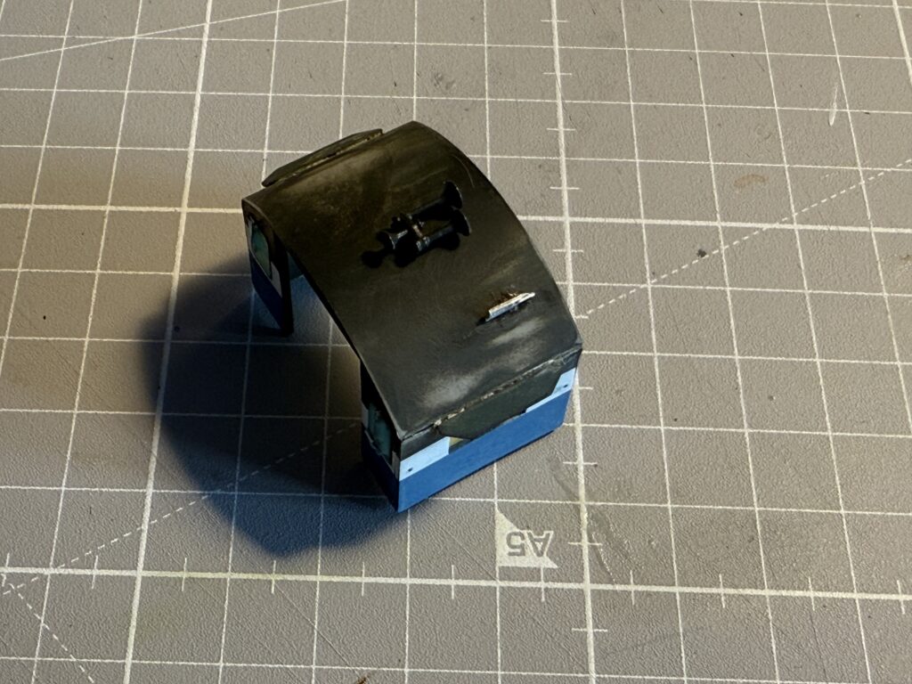 Repainting a GP9: wet-sanding the roof after details installation