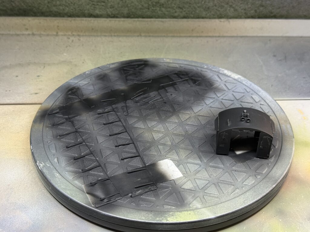 Cab and handrails primed with Vallejo Black Primer