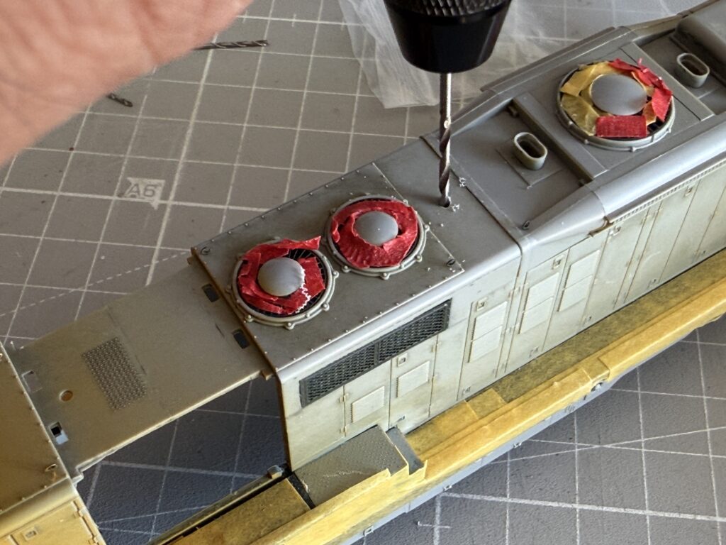 Drilling a mounting hold for the bell