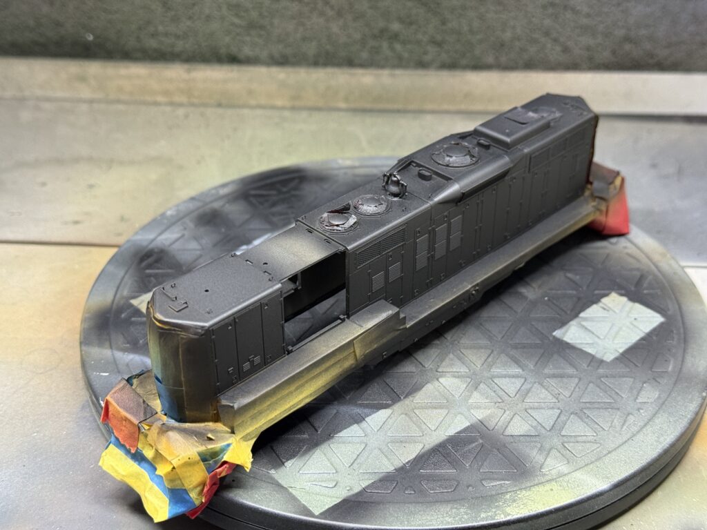 Repainting a GP9: priming the entire shell