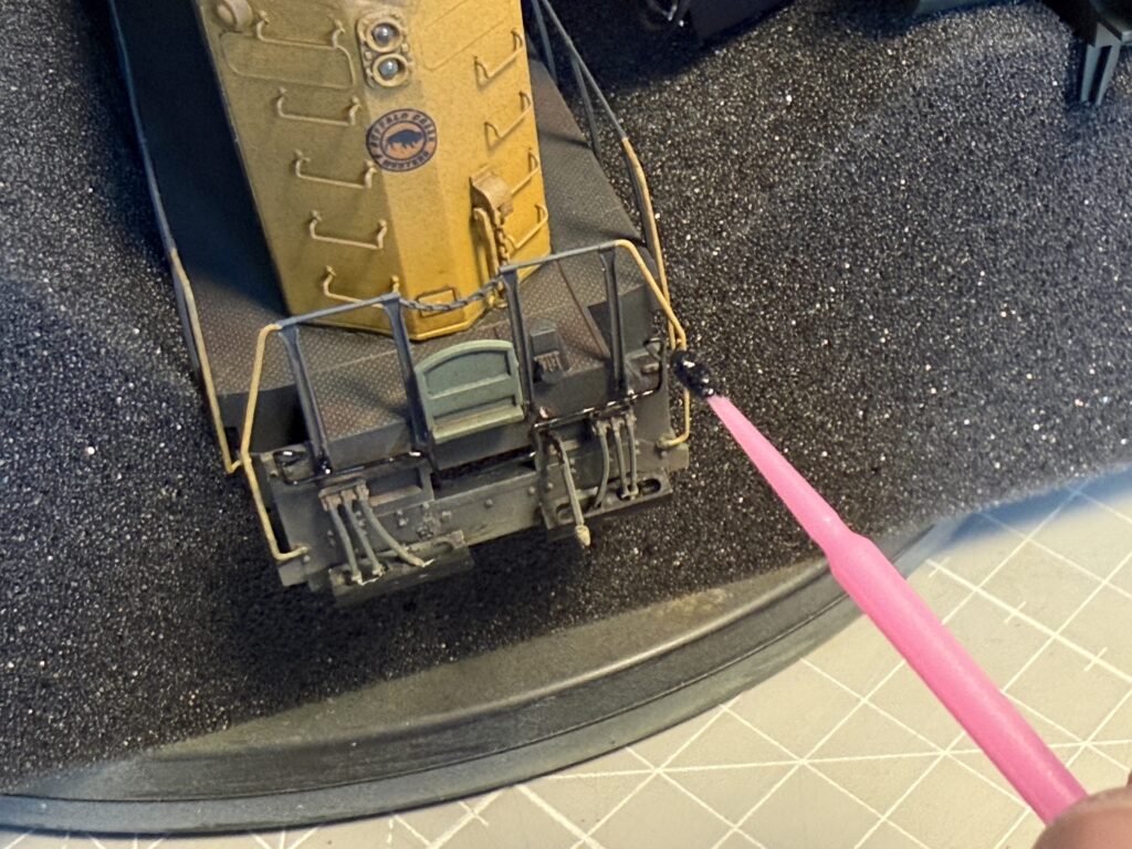 Weathering a locomotive: painting the cut lever black