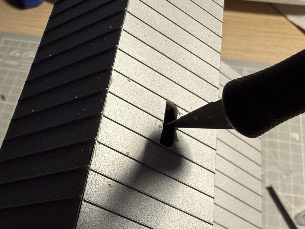 Cutting the opening on the roof of Anderson Grain Co. Elevator