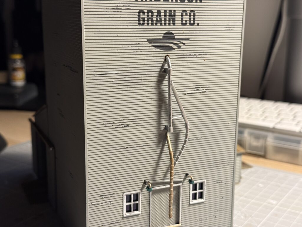 Anderson grain co. elevator part III, loading pipe glued to the structure.