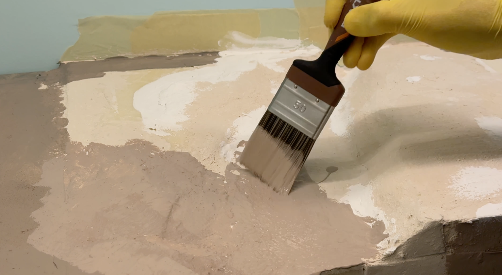 Building a bridge over the Buffalo Creek, painting the terrain a tan color