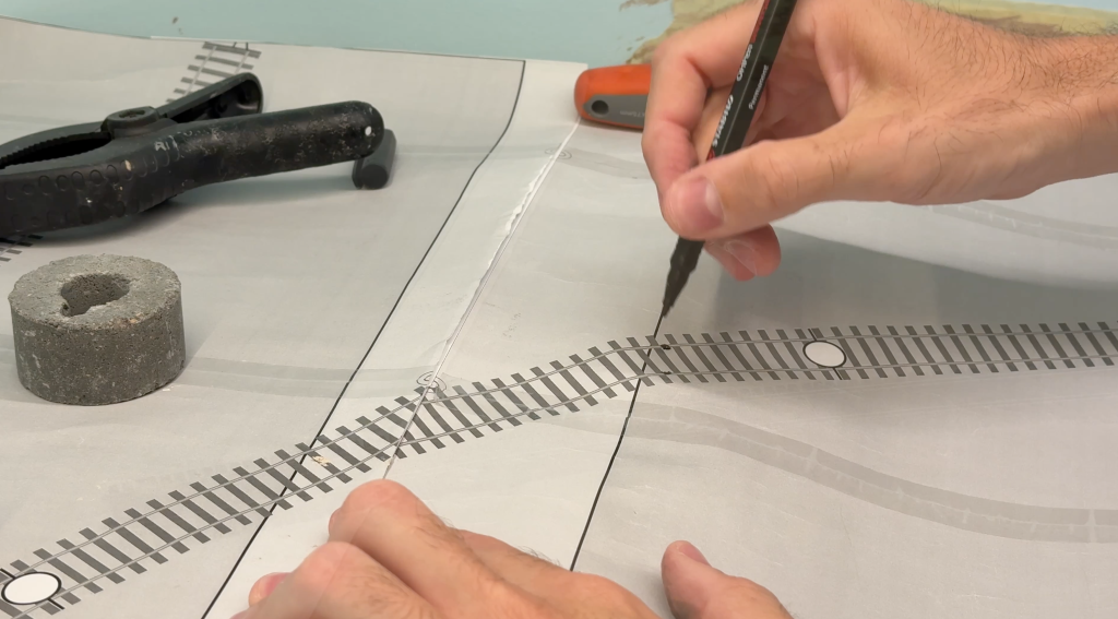 Marking track position using a 1:1 track plan.
