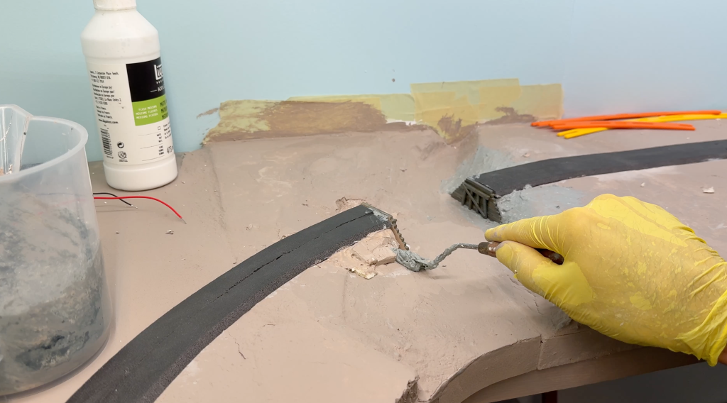 Building a bridge over the Buffalo Creek, adding terrain around the abutements
