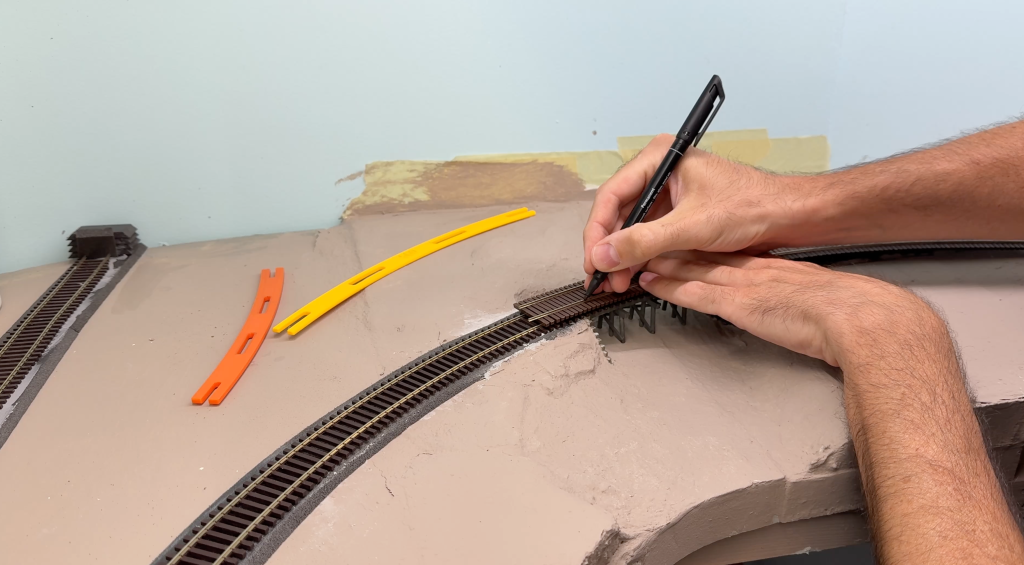 Marking cuts on the rails