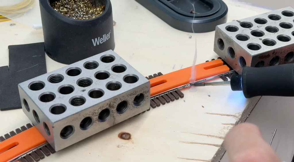 Building a bridge over the Buffalo Creek: soldering curved sections of flextrack