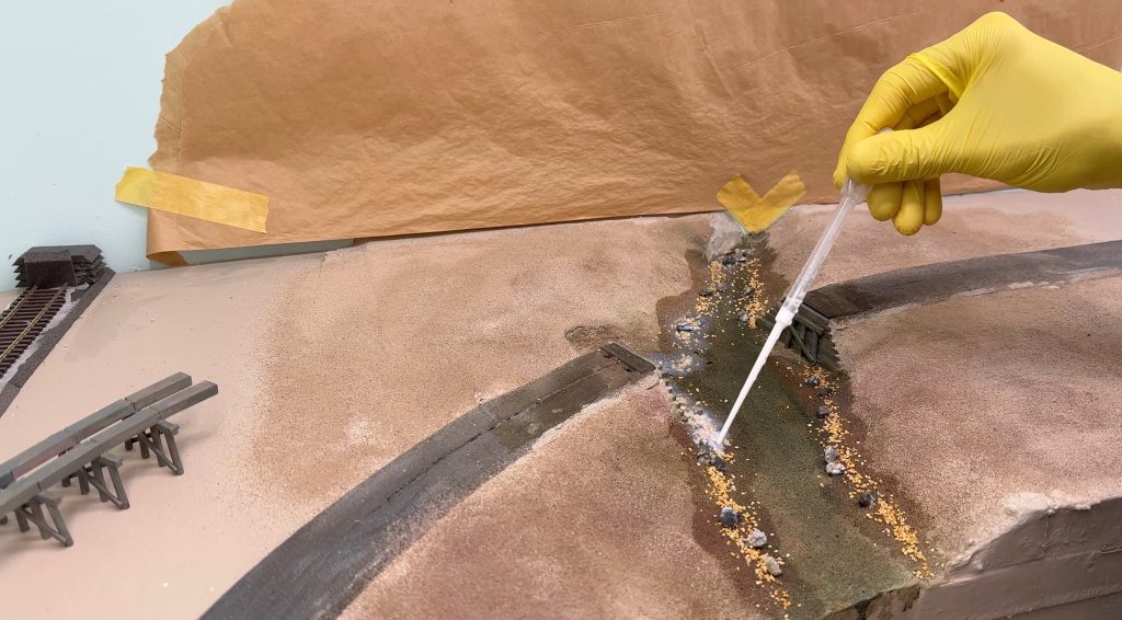 Glueing down rocks