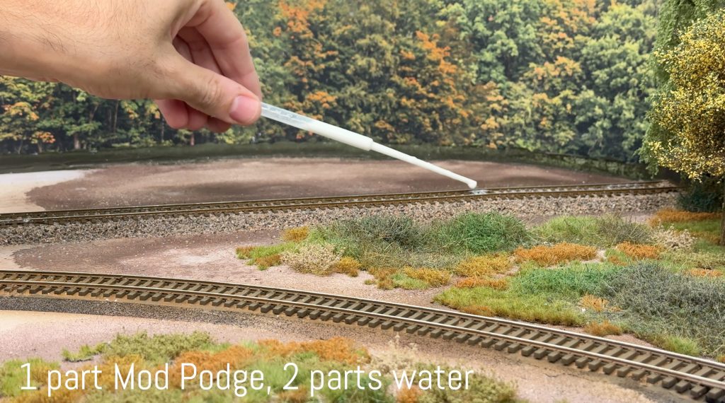 Glueing ballast with 1 part Mod Podge and 2 parts water